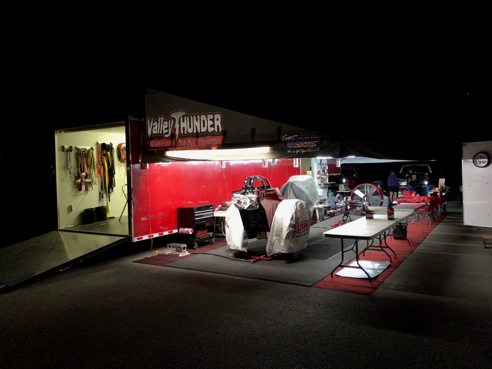 DMP race trailer awning installed on a customer rig, ready to measure and mount