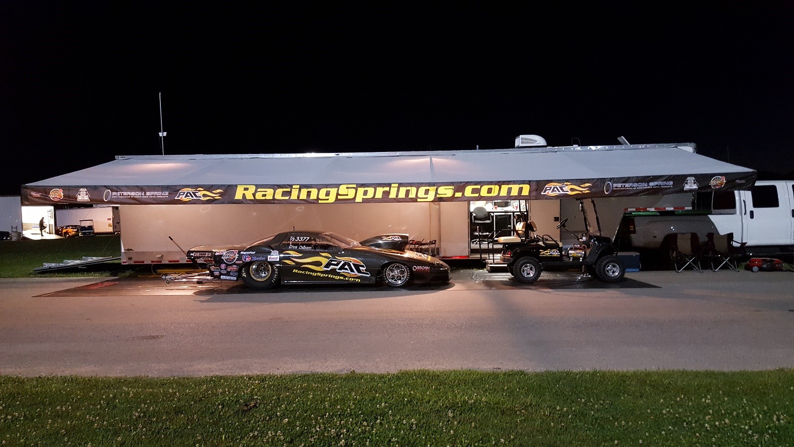 Race trailer awning set up trackside, built and printed by DMP