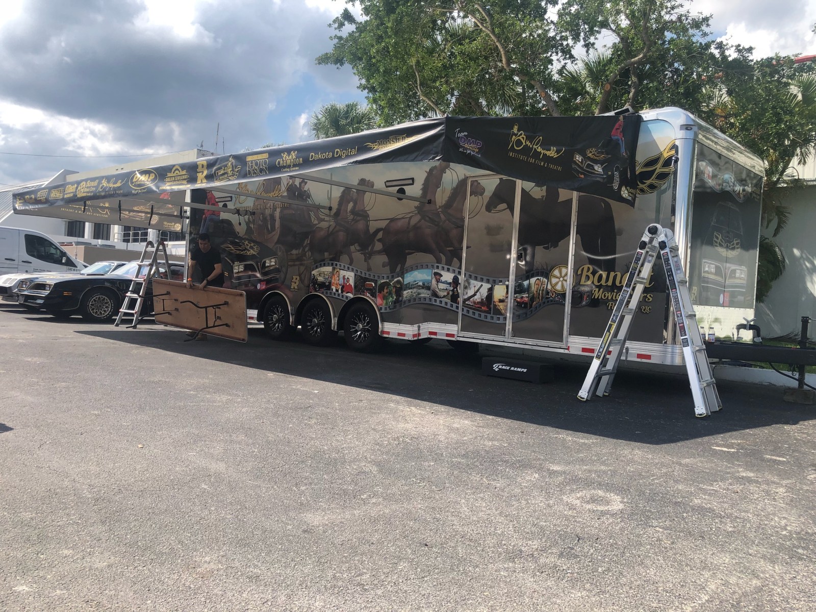 Race trailer awning set up in the pits